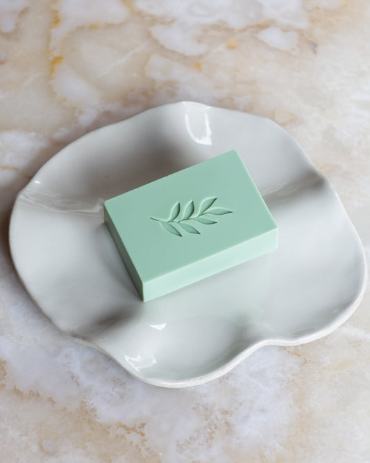 green soap with leaf imprint